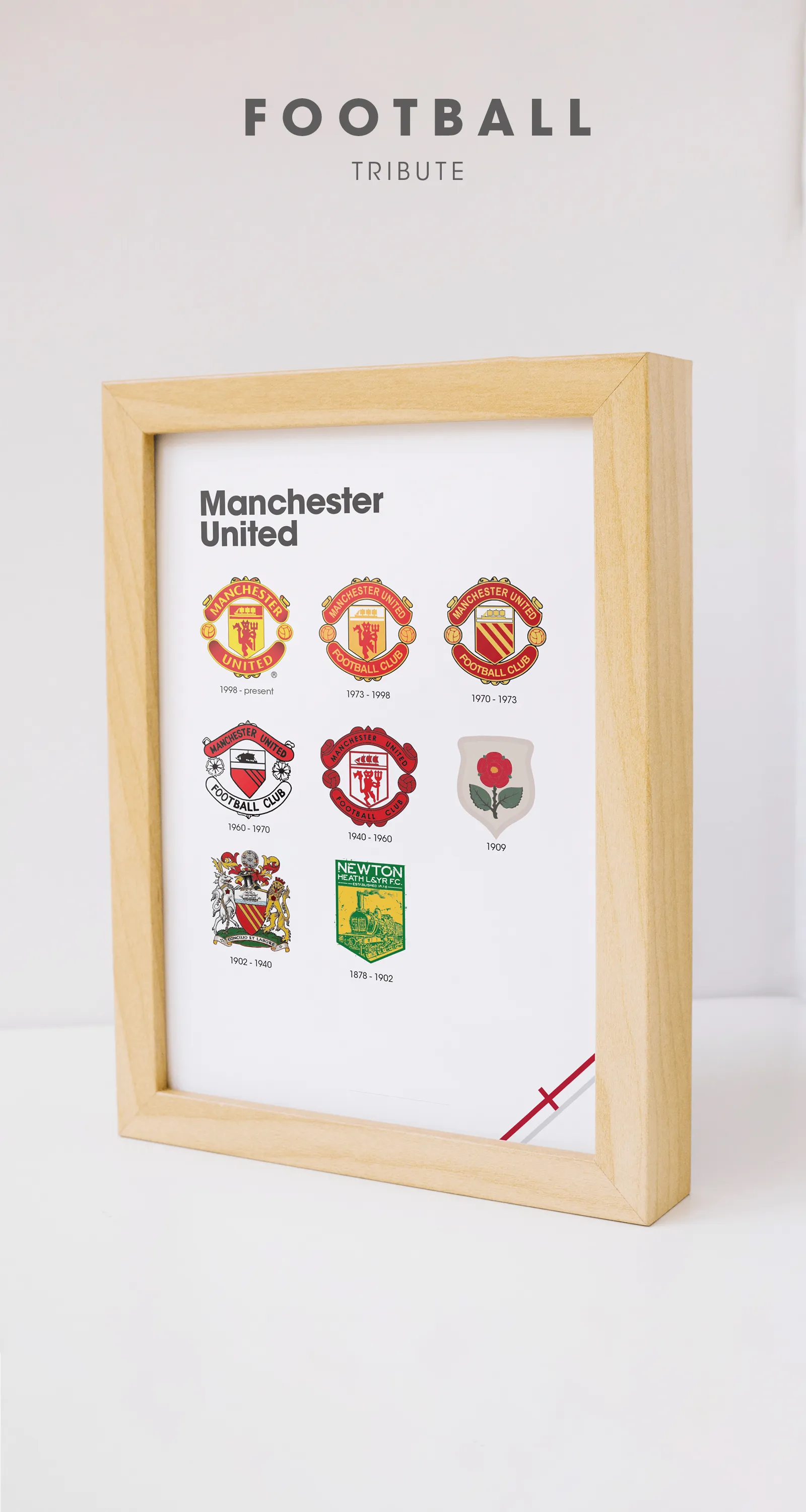Manchester United badge evolution print in an oak wood frame, styled as heritage wall art